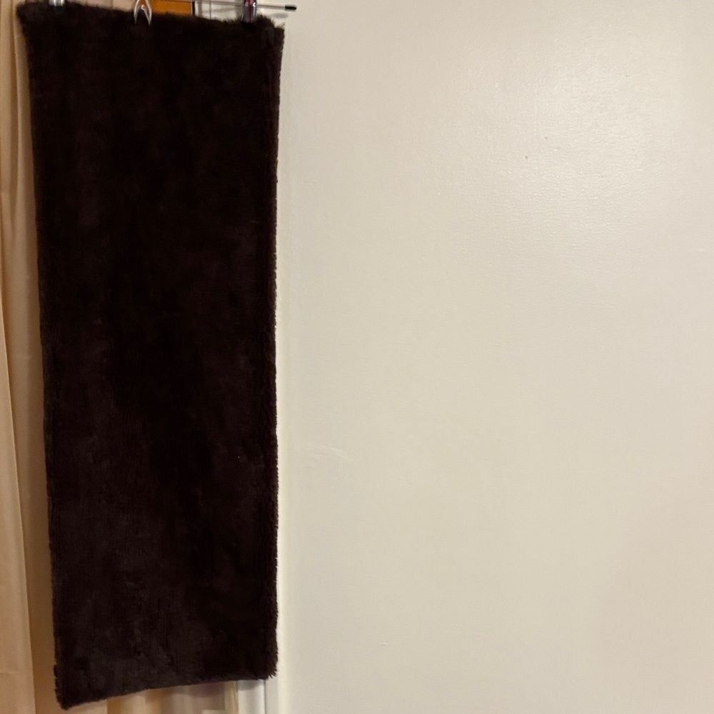 Elegant dark brown faux fur scarf.